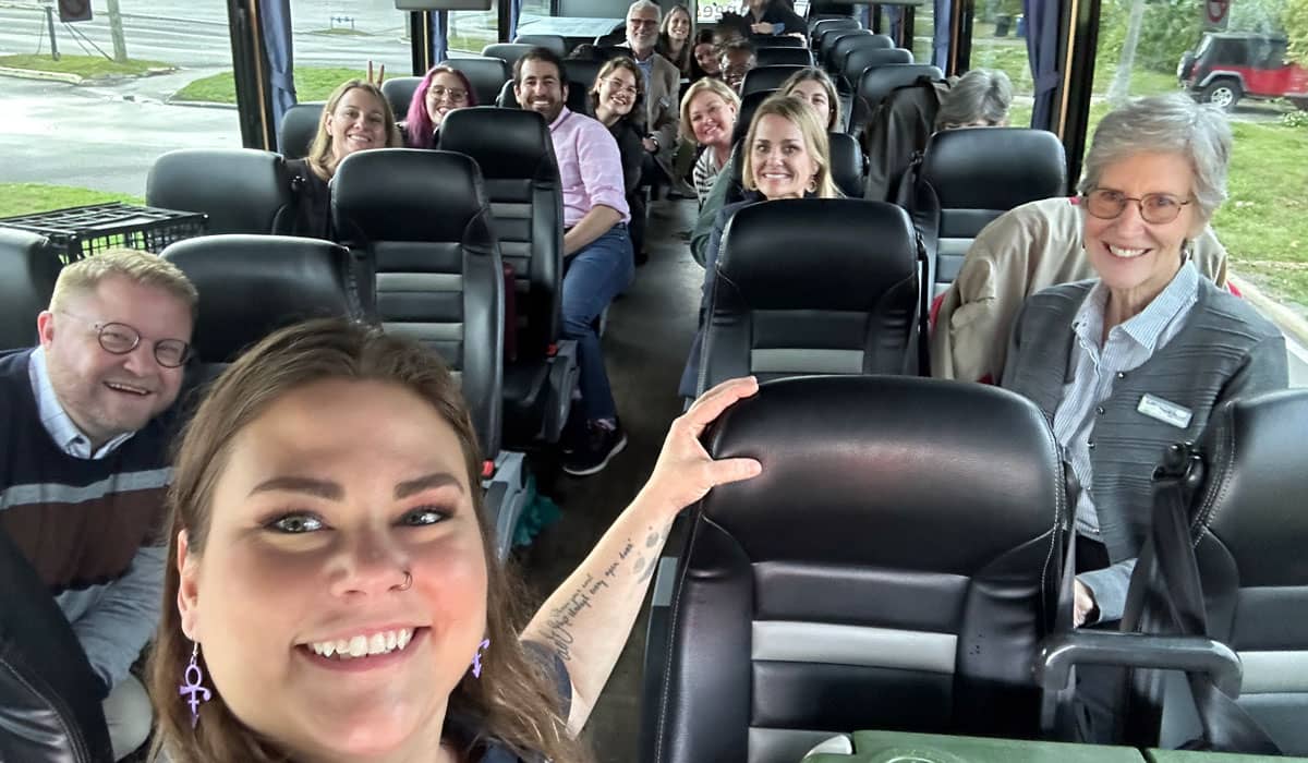 PCF staff, board members, and community partners ride a bus throughout Pinellas County for a close look at PCF's impact.