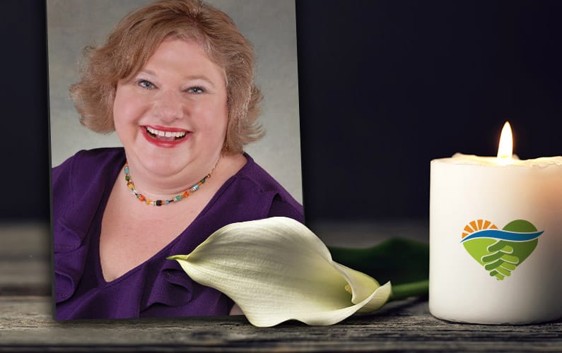 Suzanne Ruley photo with calla lily and candle